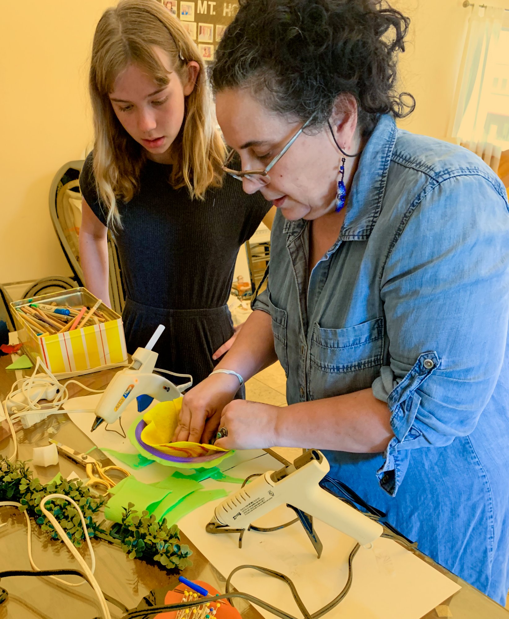 Students working with a dress form