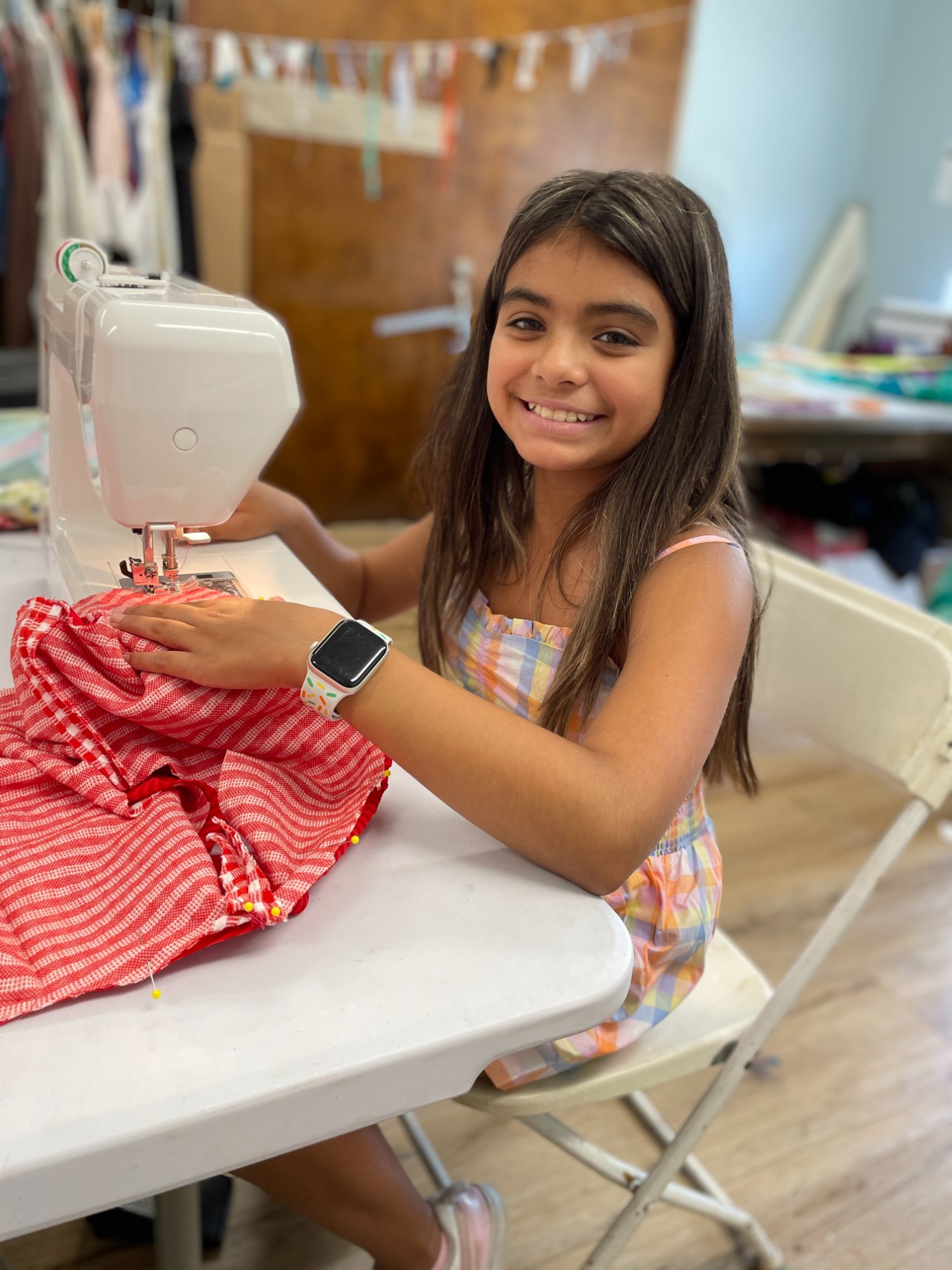 Student learning machine sewing